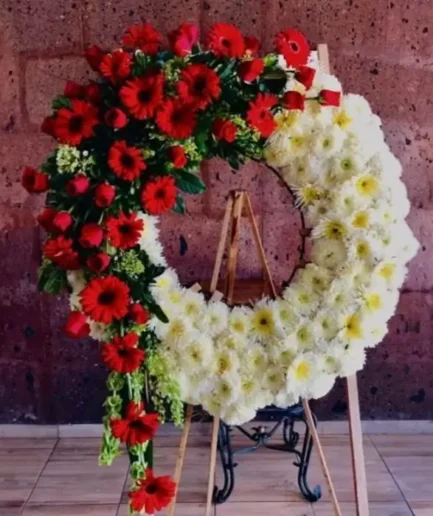 Corona Redonda Rosas, Gerberas,  y polar.