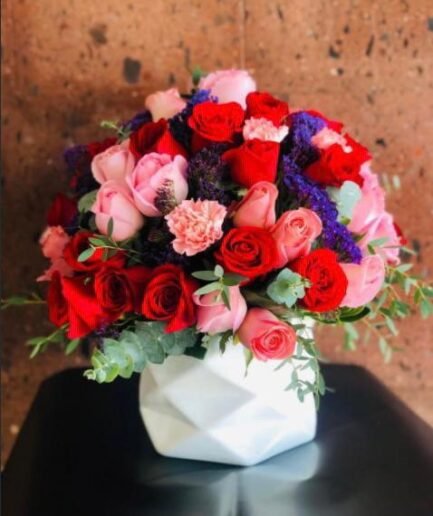 Cilindro 50 rosas y claveles