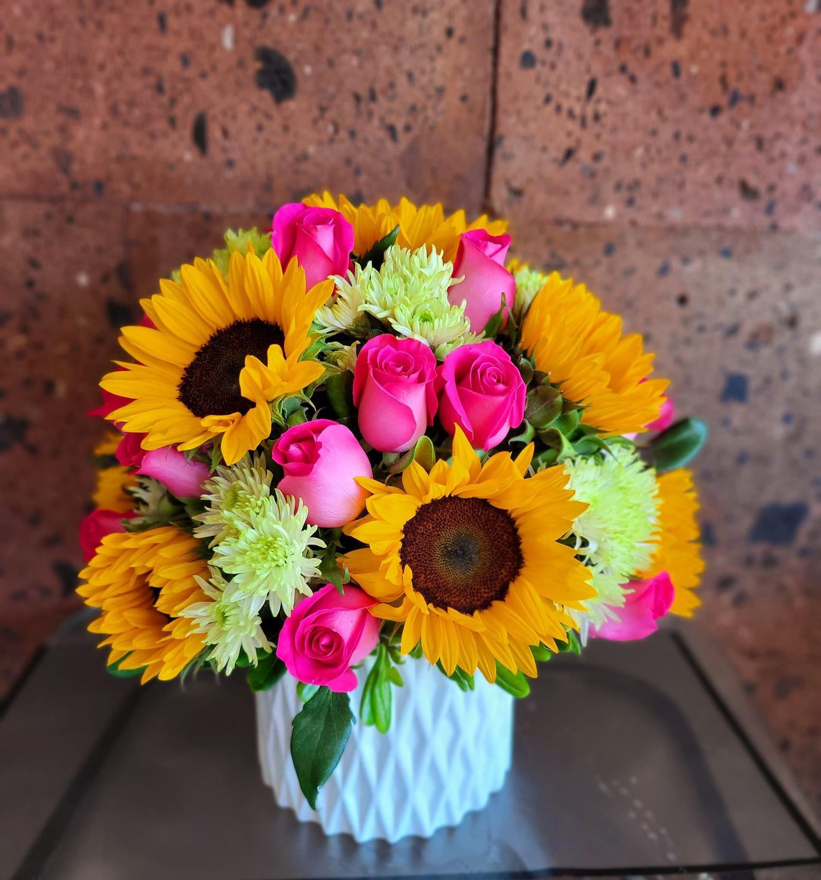 Cilindro 10 girasoles 25 rosas